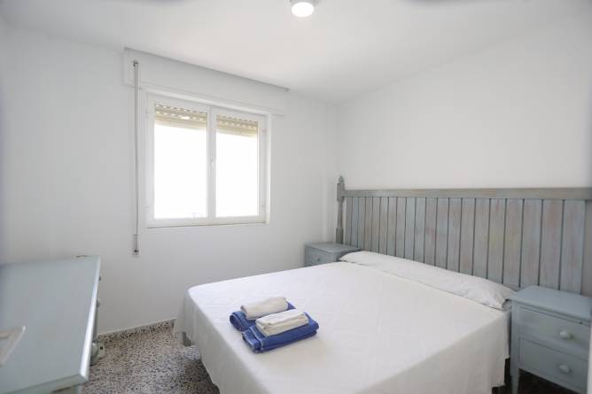 Dormitorio cama matrimonio