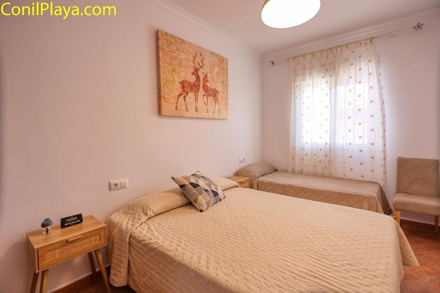 Habitación familiar con cama doble y cama individual supletoria